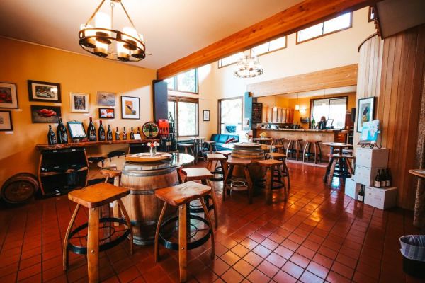 Tables and chairs set up inside our comfortable tasting room.