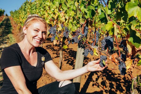 Winemaker, Ariel Eberle, shows off the beautiful Pinot noir fruit of Lakeview block